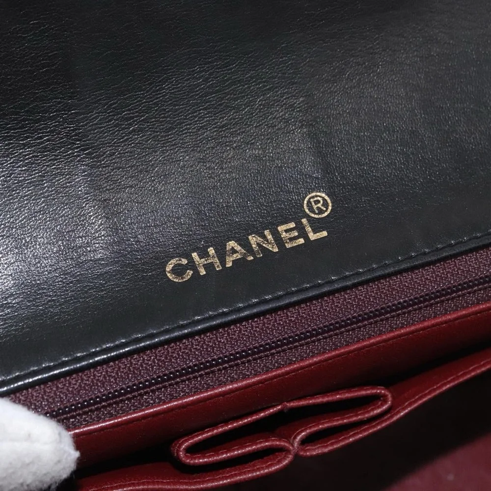 CHANEL Black Quilted Leather Shoulder Bag with Gold Hardware